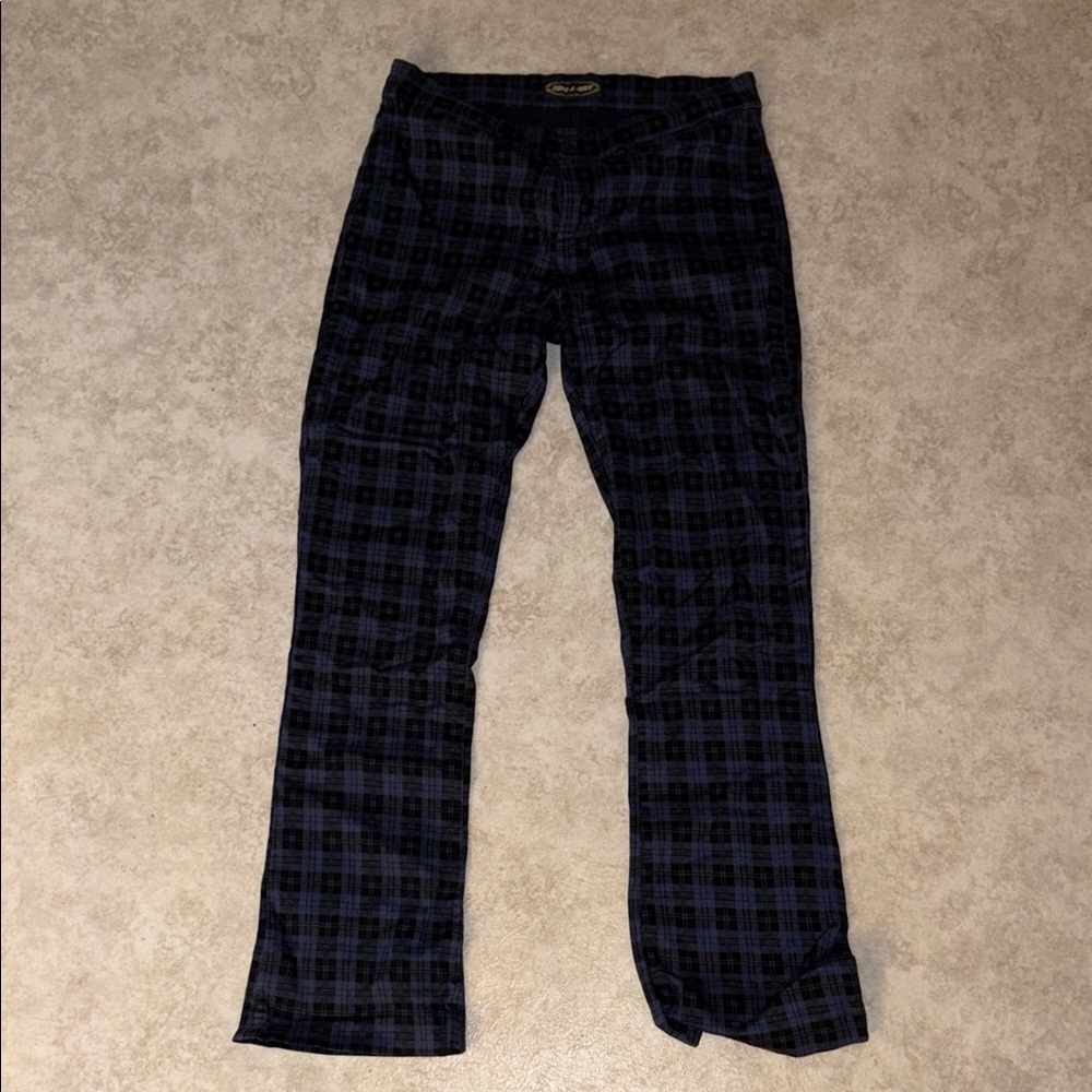Vintage navy blue plaid jeans, slight flare bottom leg, low to mid rise.